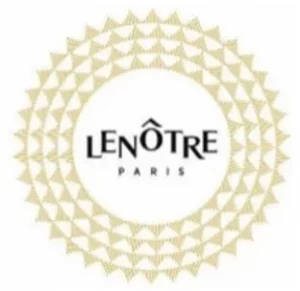 logo lenotre, avec un rond de petit triangles de couleur jaune or, avec a l'intérieur du rond écrit en noir "LeNôtre PARIS" sur fond blanc
